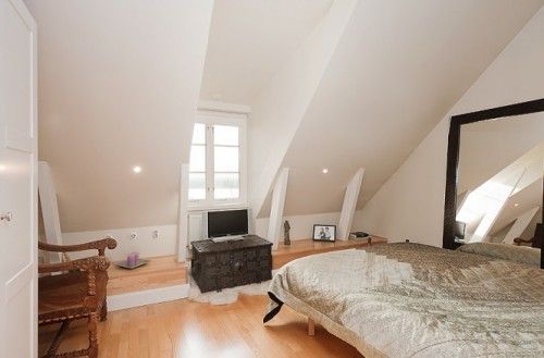 neutral white attic bedroom 665x438