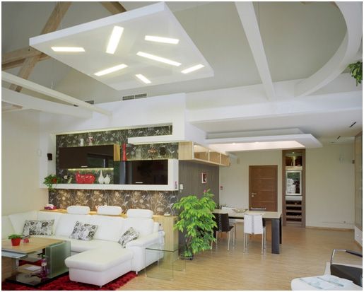 Không gian phòng khách và bếp được nhấn bởi trần thạch cao Gyproc với phong cách hiện đại Châu Âu, đơn giản nhưng tinh tế.