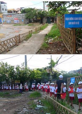 Rào tre tách lối đi bộ với đường giao thông có nhiều ô tô xe máy. Học sinh trường tiểu học Hạ Đình ( quận Thanh Xuân , HN) đi bộ đến trường với sự hướng dẫn của các tình nguyện viên tại cộng đồng ( ảnh của TG , Hanoidata ST&BT)