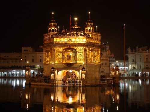 the-golden-temple-in-amritsar-india-is-a-stunning-structure-that-seems-to-have-been-dropped-right-in-the-middle-of-the-amritsar-river
