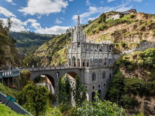 the-las-lajas-sanctuary-in-narino-colombia-is-equally-mystifying-it-looks-like-it-defies-gravity