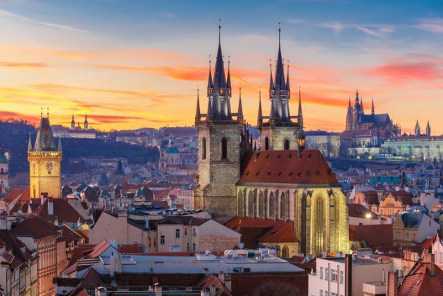 Aerial view over Church of Our Lady before Tyn Old Town and Prague Castle at sunset in Prague Czech Republic