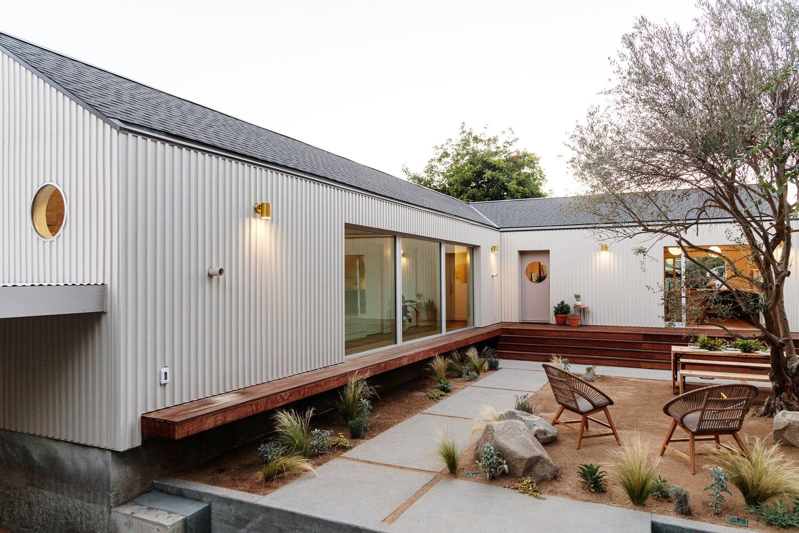 the-original-1000-square-foot-house-where-the-open-living-dining-and-kitchen-area-is-mostly-located-abuts-the-new-1000-square-foot-addition-in-an-t-configuration-to-make-the-best-use-of-the-site.jpg